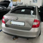 Замена заднего стекла на Skoda Rapid